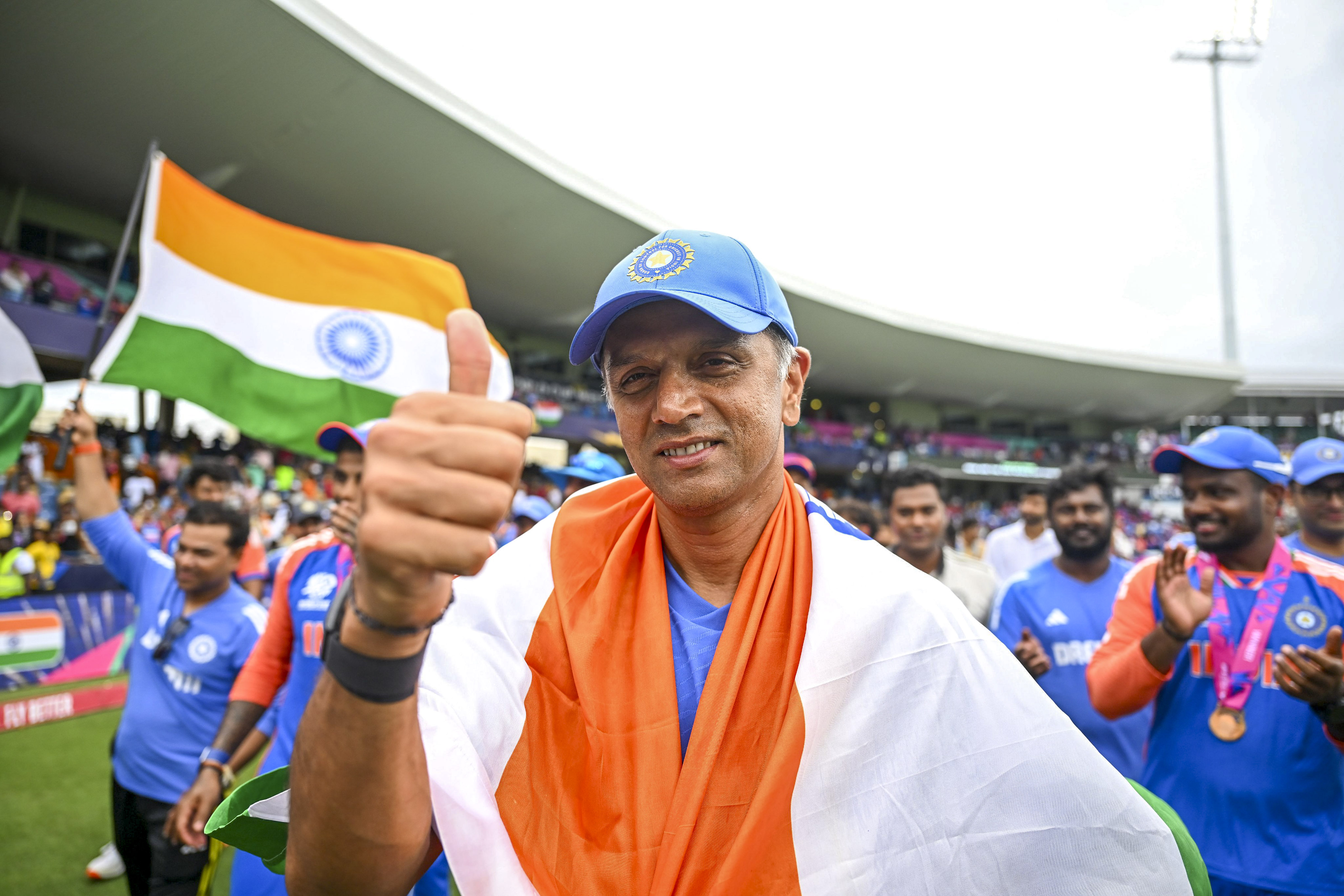 Outgoing India head coach Rahul Dravid celebrates after guiding India to T20 World Cup 2024 trophy. (PTI)