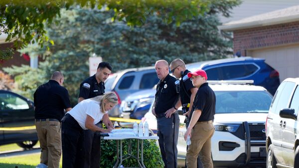 Police investigate the scene after responding to a shooting, Saturday, July 6, 2024, in Florence, Ky.