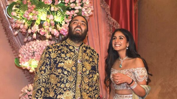 Mumbai: Anant Ambani, Reliance Industries Chairman Mukesh Ambani's son, and Radhika Merchant pose for photos during their sangeet ceremony, in Mumbai, Friday, July 5, 2024. (PTI Photo) (PTI07_05_2024_000416A)