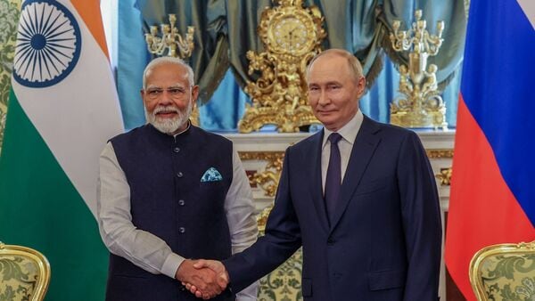 Moscow, Jul 9 (ANI): Prime Minister Narendra Modi exchanges greetings with Russian President Vladimir Putin during a bilateral meeting, in Moscow on Tuesday. (ANI Photo)