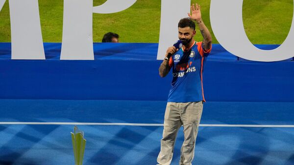 India's cricket player Virat Kohli speaks and waves during a ceremony at Wankhede Stadium, Thursday, July 4, 2024, in Mumbai, India, celebrating their Twenty20 Cricket World Cup win. (AP Photo/Rafiq Maqbool)