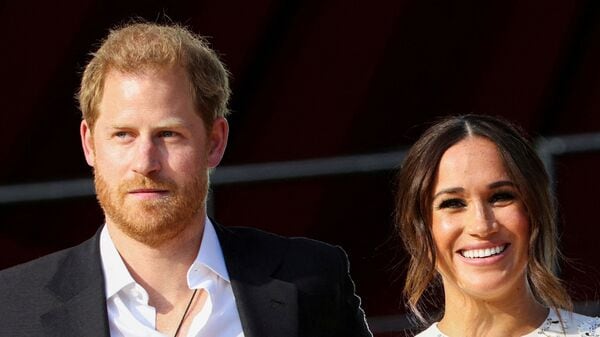 FILE PHOTO: Britain's Prince Harry and Meghan Markle appear 