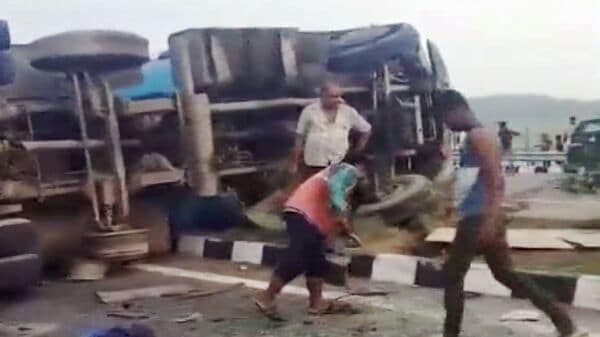 Unnao: People stand near an overturned vehicle after an accident, in Unnao district, Wednesday, July 10, 2024. At least 18 people were killed and 19 injured when a bus collided with a tanker on the Agra-Lucknow Expressway in the Uttar Pradesh district on Wednesday, police said. (PTI Photo) 