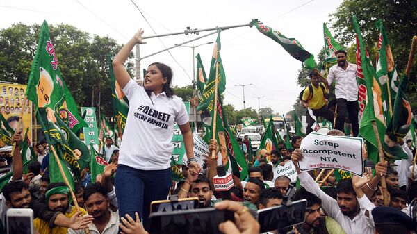 NEET UG 2024 Hearing Live Updates: Rashtriya Janata Dal (RJD) student wing supporters raise slogans during their protest march to Raj Bhawan against the alleged the NEET-UG and UGC-NET examinations issue, in Patna on Tuesday. (ANI Photo) (Pappi Sharma)