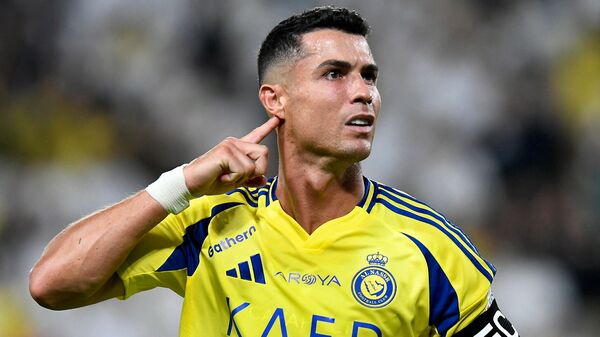 Al Nassr's Cristiano Ronaldo celebrates scoring their second goal in the Saudi Pro League against Al Raed at Al-Awwal Stadium in Riyadh on 22 August, REUTERS/Stringer