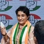 Wrestler Vinesh Phogat joins the Congress, at AICC headquarters in New Delhi on Friday. Congress leader Pawan Khera is also seen. (ANI)