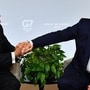 Indian Prime Minister Narendra Modi (L) and US President Donald Trump shakes hands as they speak during a bilateral meeting in Biarritz, south-west France on August 26, 2019, on the third day of the annual G7 Summit. (AFP)