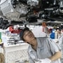 Workers on the assembly line at a Leapmotor production facility in Zhejiang province, China. Photo: Bloomberg News