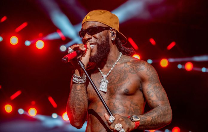 Burna Boy performs onstage during Day 1 of the Afro Nation Detroit Festival on August 19, 2023