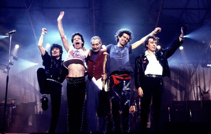 Ron Wood, Mick Jagger, Charlie Watts, Keith Richards and Bill Wyman of the Rolling Stones wave to the crowd at the Historic Atlantic City Convention Hall in 1989. Credit: Paul Natkin/Getty Images