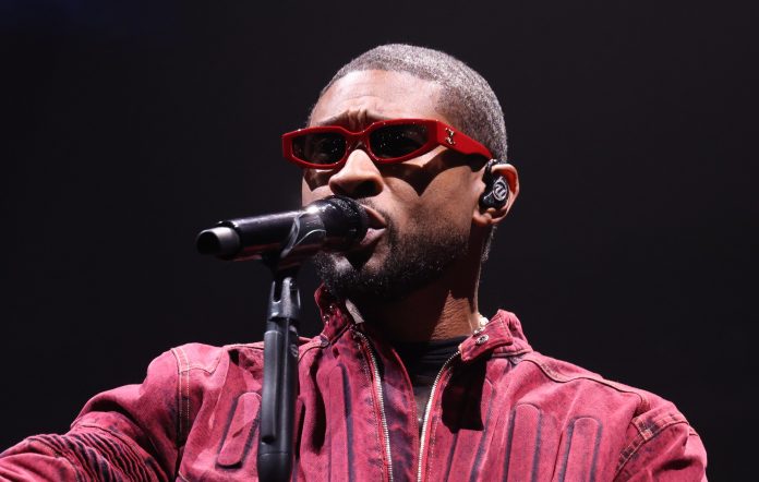 Usher performs live in December 2023. Credit: Scott Legato/Getty Images