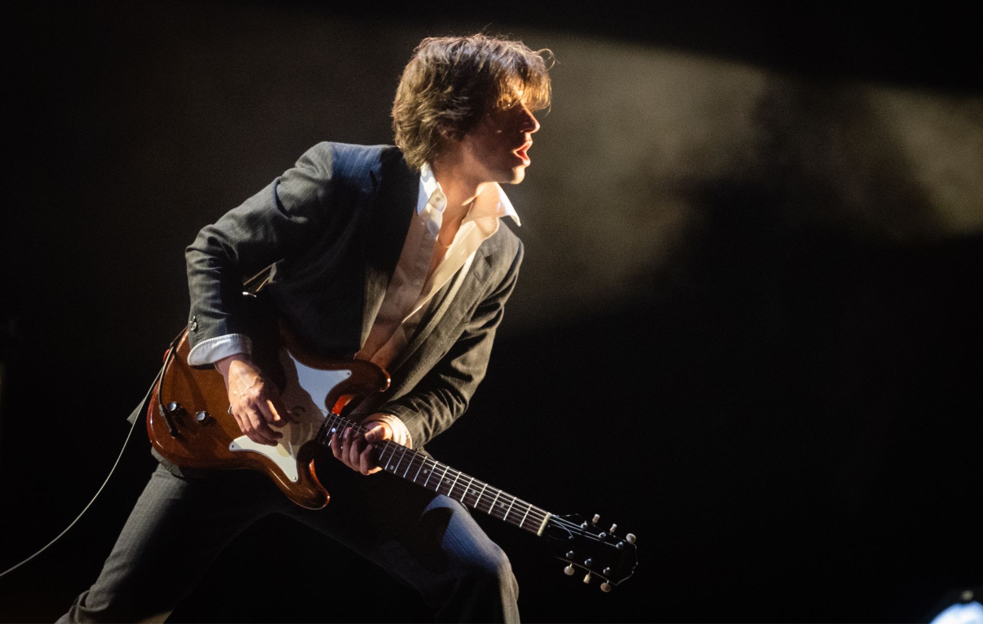 Alex Turner of Arctic Monkeys performs as the band headline the Pyramid Stage at Day 3 of Glastonbury Festival 2023 on June 23, 2023 in Somerset, United Kingdom.