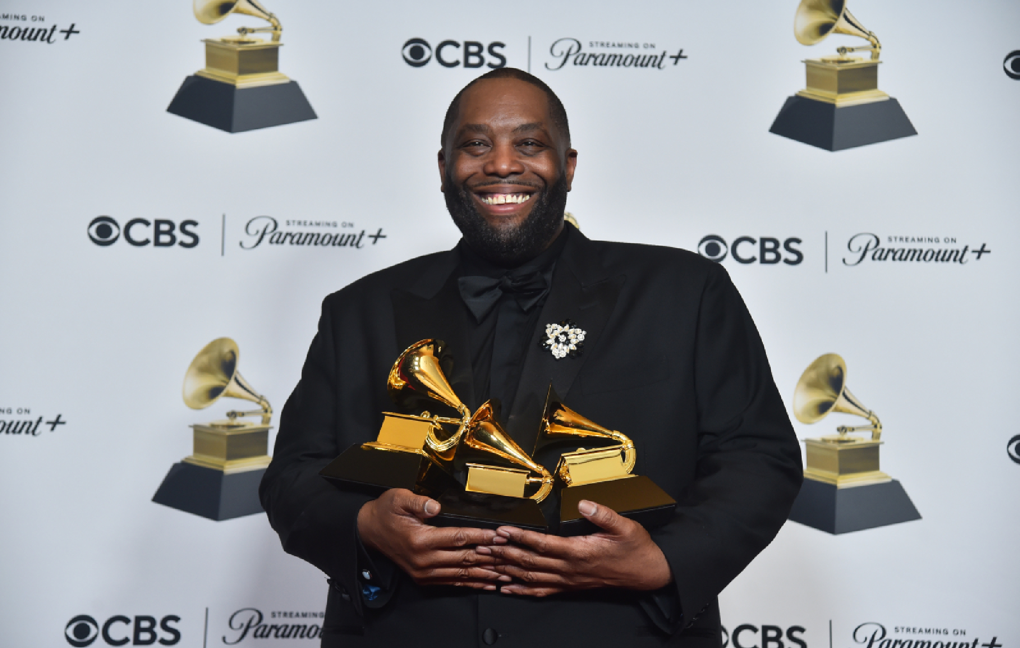 Killer Mike holding Grammys