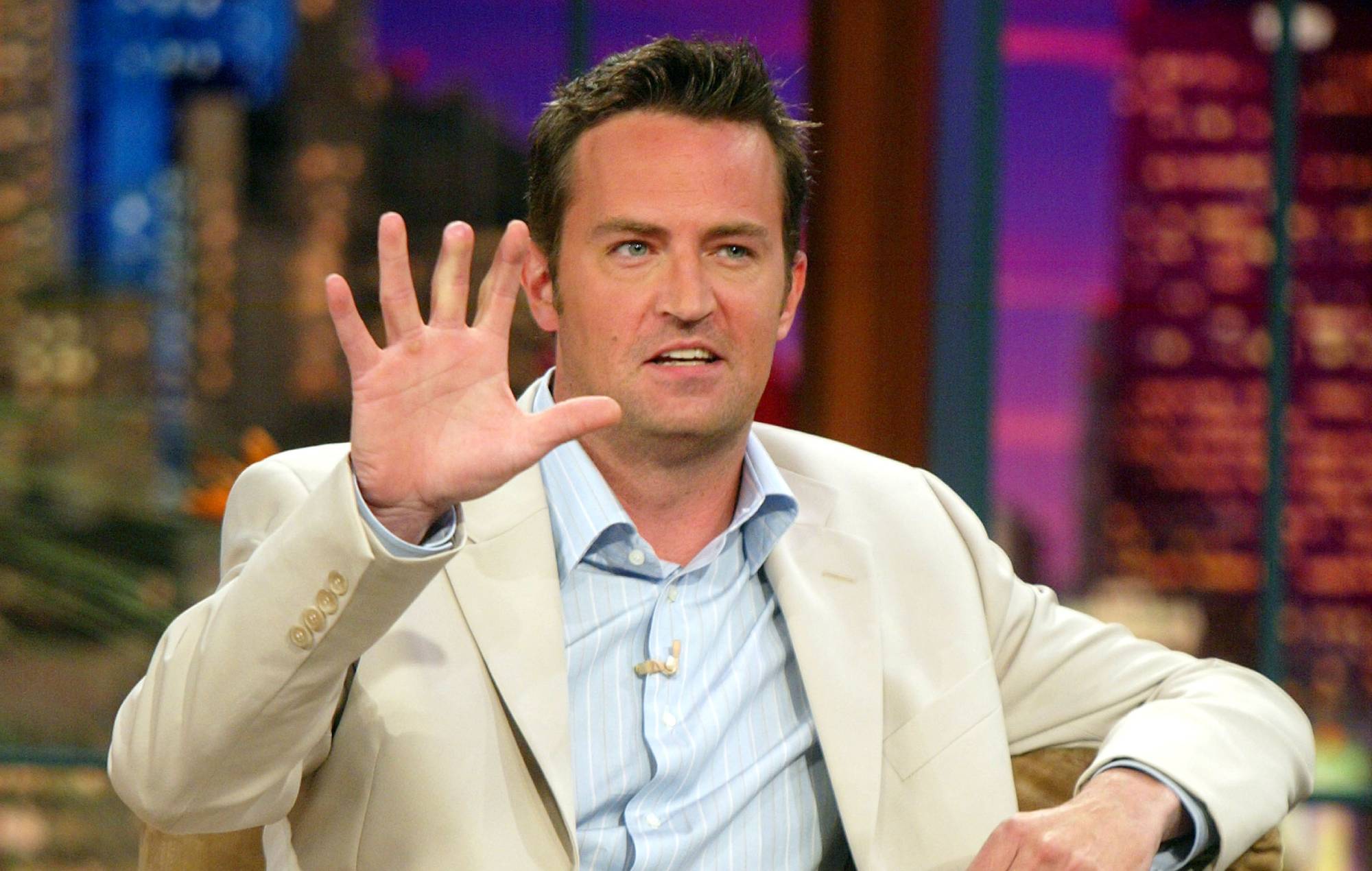 Actor Matthew Perry appears on "The Tonight Show with Jay Leno" at the NBC Studios on April 8, 2004 in Burbank, California. (Photo by Kevin Winter/Getty Images)