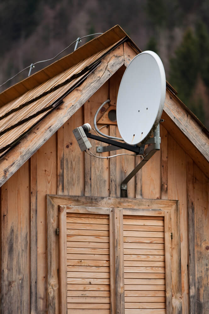 lovely wooden cabin home with satellite antenna