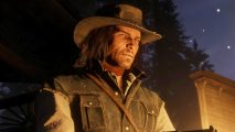 Games like Red Dead 2 struggle to tell stories – Die Hard proves why. A cowboy with a scarred face and long hair, John Marston from Red Dead Redemption 2, stands above an open fire