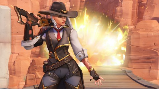 Overwatch 2 characters: a womna with white hair and a cowboy hat walks away from an explosion.