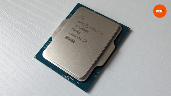 The Intel Core i9 14900K against a white wooden background