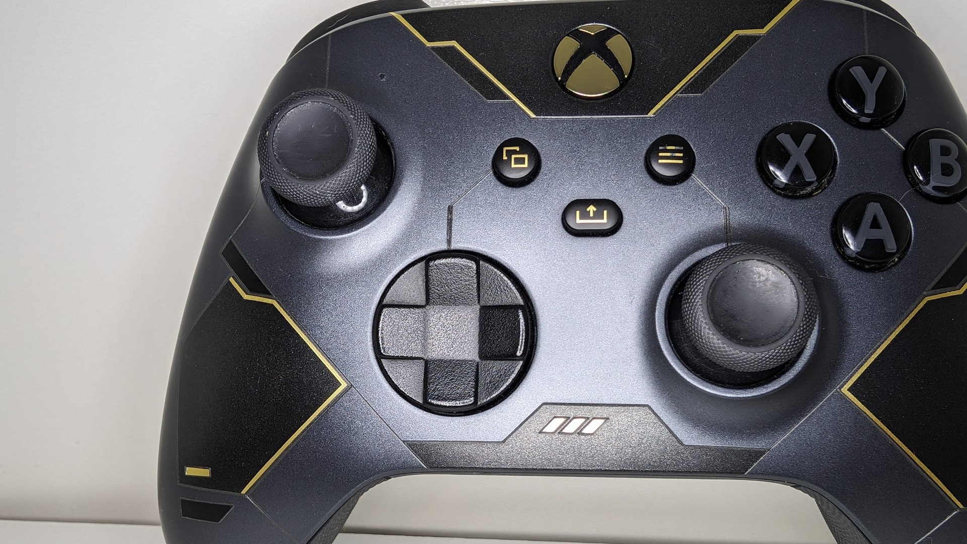 Xbox Wireless Controller review image showing a zoomed in view of the darker controller seen earlier in the piece.