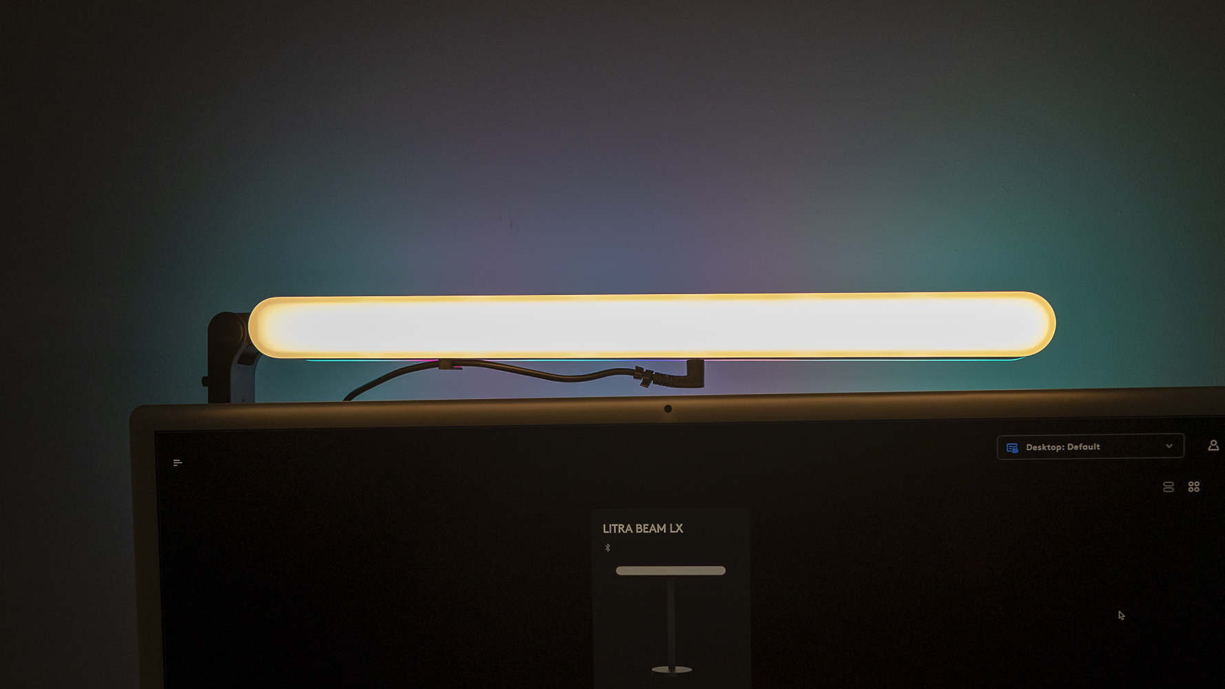 The Logitech G Litra Beam LX behind an iMac