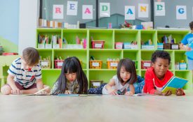 This is a photo of kids reading books in a classroom