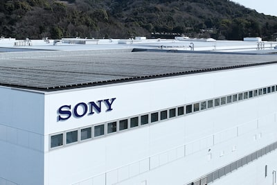 Photograph showing factory roof with solar panel and “SONY” logo