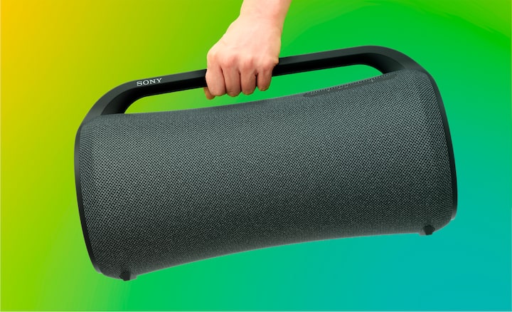 The SRS-XG500 speaker with a hand holding the easy-to-grip top handle.