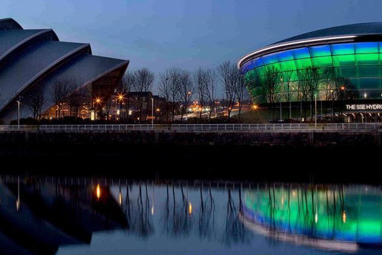 Conference building with green lights at night