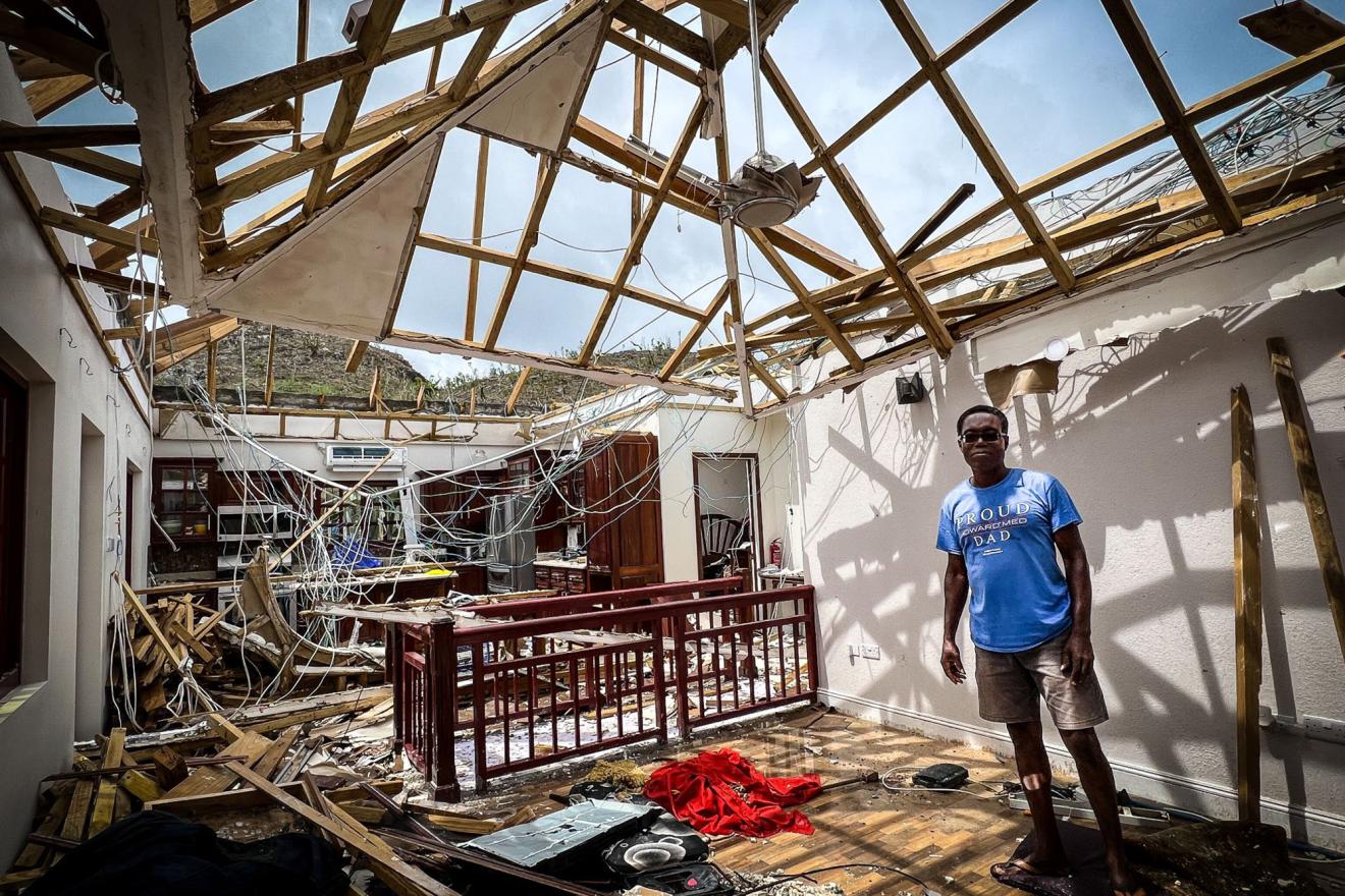 A man inside his home destroyed by Hurricane Beryl.