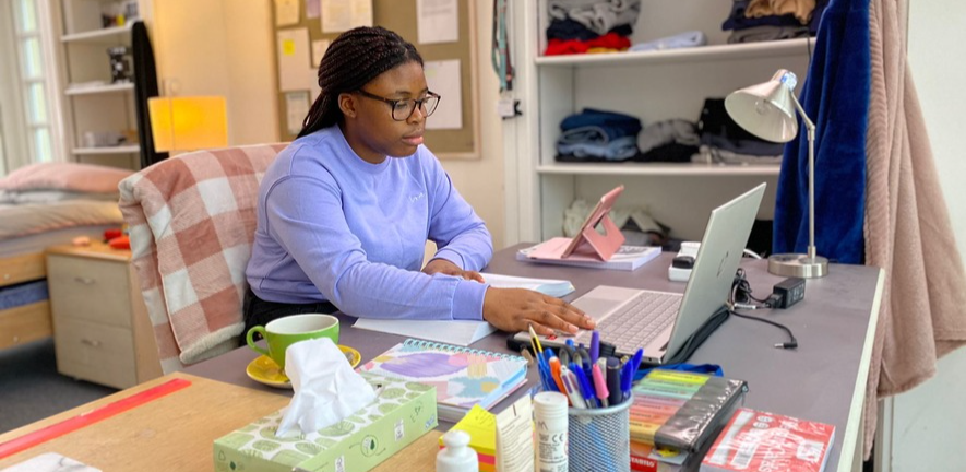 Student working at laptop