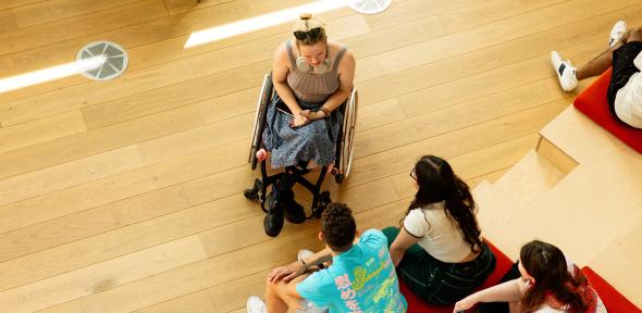 Disabled group of students sitting in the accessibility area