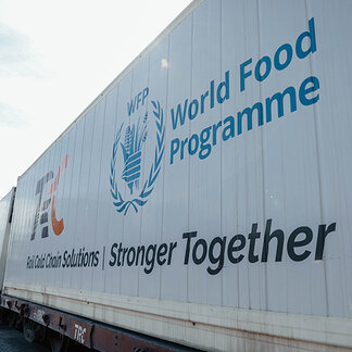 a truck with WFP and TEC logo